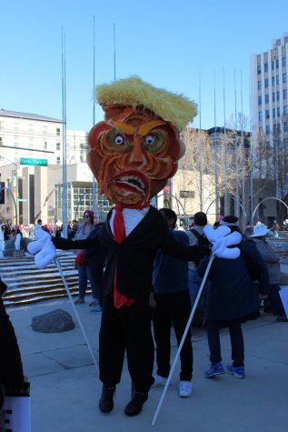 A Donald Trump costume held the center of attention at Womens March San Jose