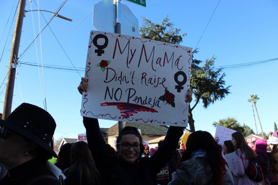 A happy marcher poses during Womens March San Jose