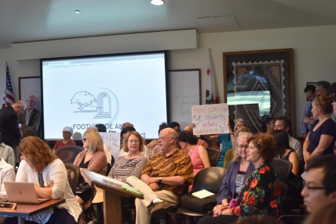Faculty gather in protest of withheld cost-of-living adjustments at a Foothill-De Anza District meeting in June. 