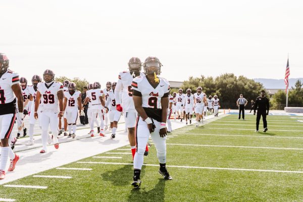 Owls enter the field pregame @ CSM.