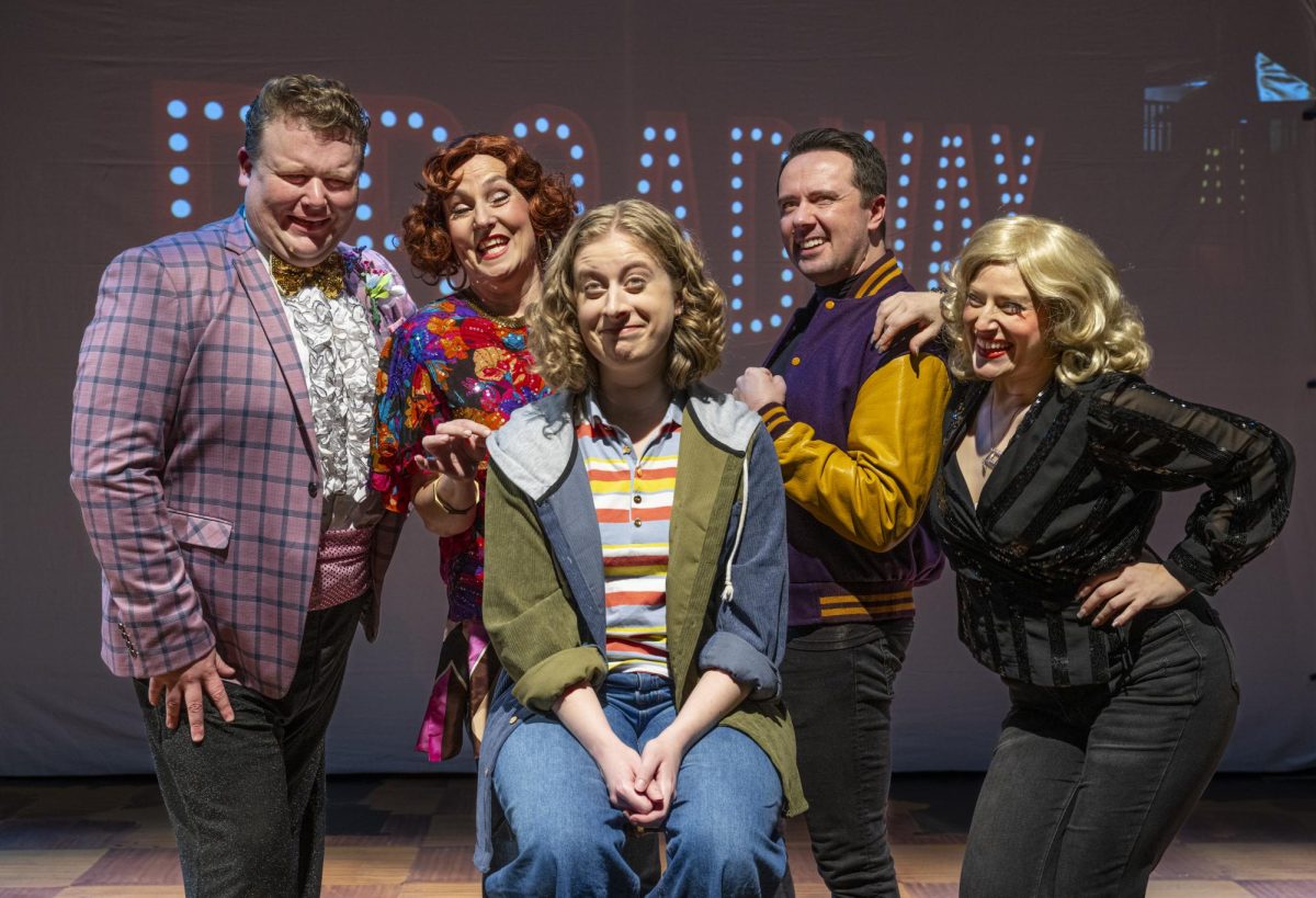 From left to right: Andrew Ross (Barry Glickman), Annmarie Macry (Dee Dee Allen), Samantha Rich (Emma Nolan), Jason Mooney (Trent Oliver), Michele Schroeder (Angie Dickinson)